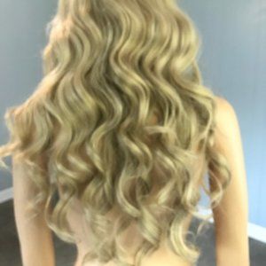 Long Blonde Curly Wavy Synthetic Wig New without tags.